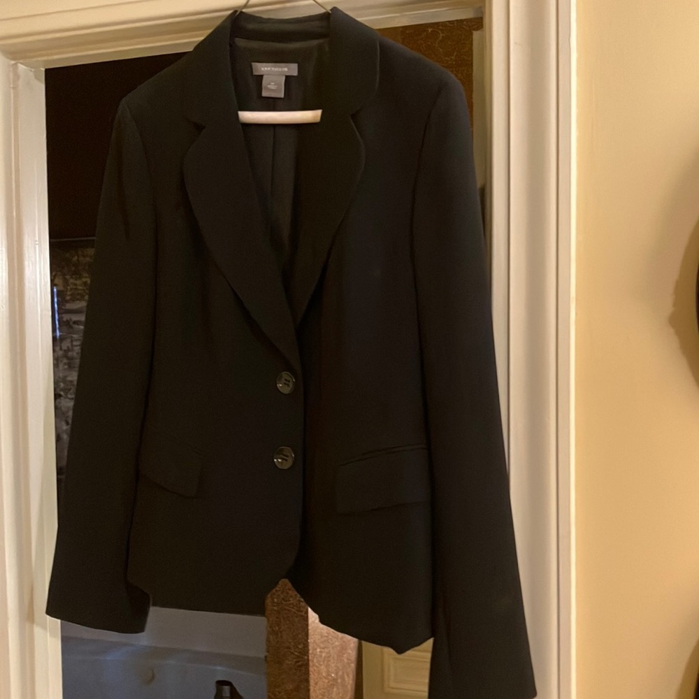 Woman’s suit jacket.  Ann Taylor, size 10.  Triacetate and polyester.